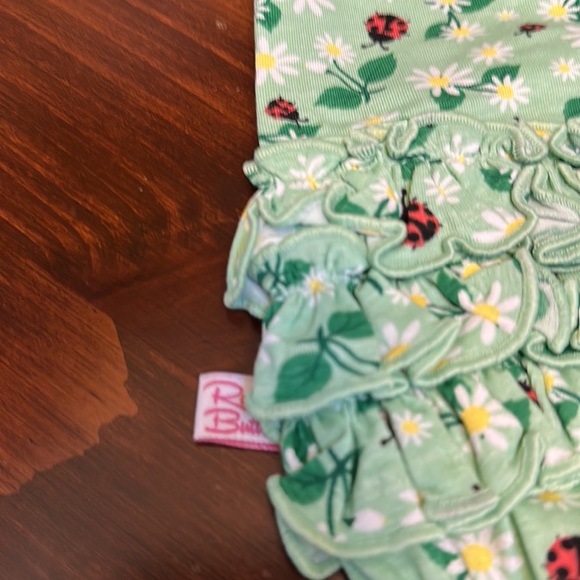 RUFFLE BUTTS Infant Girl Rufflebutts Daisies & Ladybugs Ruffle Detail Romper - Picture 11 of 15